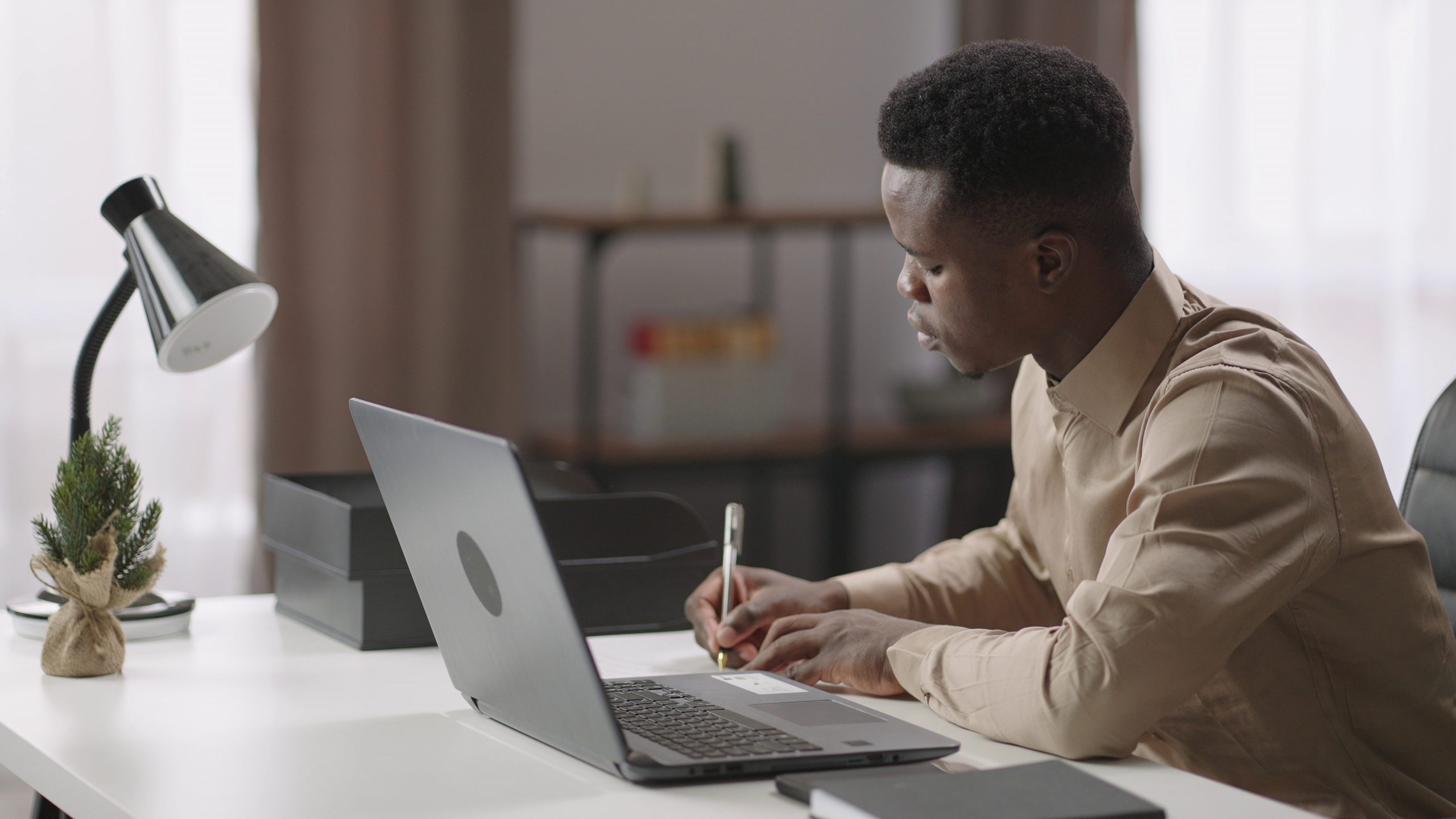 Marketer building their own email list on laptop - email list ownership concept